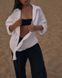 Літня вільна однотонна сорочка з льону жіноча білого кольору RG6220/ 1071 фото 1 — Beauty&Fashion