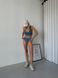 Безшовний базовий однотонний комплект спідньої білизни (топ зі знімними чашечками, трусики стрінги) жіночий синього кольору SM2182 фото 3 — Beauty&Fashion