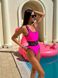 Сплошной однотонный купальник с черными вставками на талии женский розового цвета 2561 фото 2 — Beauty&Fashion