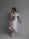 Однотонна сукня з відкритими плечима та розрізом жіноча білого кольору S824/825/1454 фото 2 — Beauty&Fashion