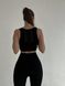 Зручний та стильний спортивний топ однотонний жіночий чорного кольору FS1723 фото 5 — Beauty&Fashion