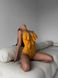 Суцільний купальник в рубчик однотонний з об'ємними воланчиками жіночий жовтого кольору 897 фото 4 — Beauty&Fashion