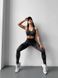 Мраморний спортивний фітнес топ жіночий чорного кольору GO1 фото 4 — Beauty&Fashion