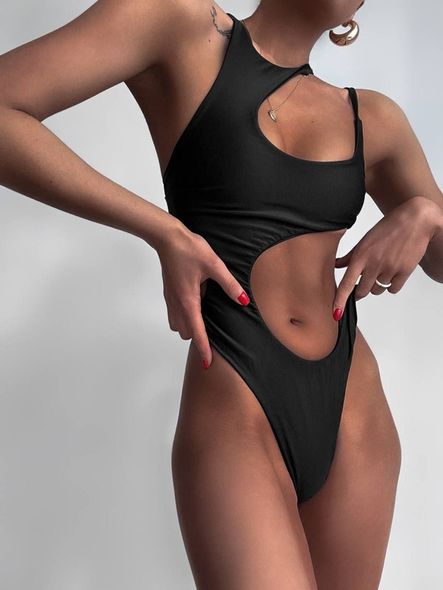 Суцільний однотонний купальник з вирізами жіночий чорного кольору фото — Beauty&Fashion