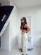 Котоновые однотонные брюки карго женские молочного цвета S1517/108 фото 2 — Beauty&Fashion