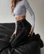 Кожаные однотонные лосины с завязками женские черного цвета R844/136 фото 5 — Beauty&Fashion