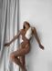 Яскравий суцільний купальник з вирізами жіночий мокко кольору 2768 фото 2 — Beauty&Fashion