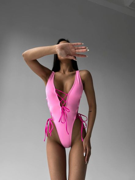Суцільний сексуальний купальник з зав'язками та вирізами жіночий рожевого кольору фото — Beauty&Fashion