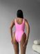 Суцільний сексуальний купальник з зав'язками та вирізами жіночий рожевого кольору 2784 фото 7 — Beauty&Fashion
