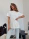 Однотонна вільного крою футболка жіноча білого кольору G788/8890 фото 4 — Beauty&Fashion