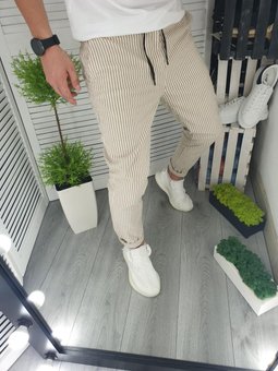 Стильні котонові штани чоловічі бежевого кольору фото — Beauty&Fashion