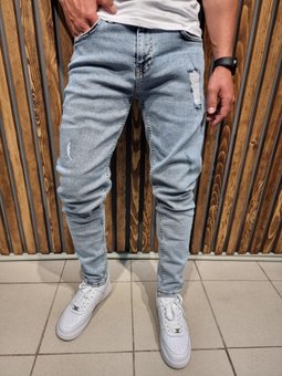 Стильні класичні джинси рвані чоловічі синього кольору фото — Beauty&Fashion
