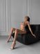 Розкішний однотонний комплект спідньої білизни з мереживом (бюстгальтер, трусики стрінги, пояс для панчох, гартери ) жіночий бежевого кольору SM2170 фото 3 — Beauty&Fashion