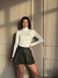 Шкіряні однотонні стильні шорти на флісі жіночі чорного кольору R1544/187 фото 2 — Beauty&Fashion