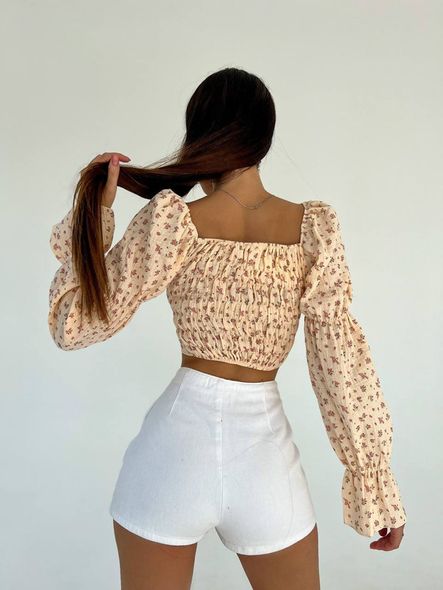 Літній легкий муслиновий топ з рукавами жіночий білого кольору фото — Beauty&Fashion