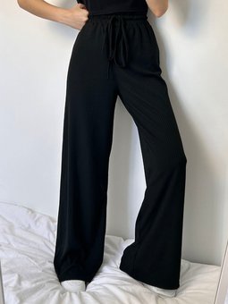 Летние однотонные свободного кроя брюки в рубчике женские черного цвета фото — Beauty&Fashion