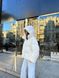 Теплая меховая куртка с наполнителем экопух женская молочного цвета S 50 фото 4 — Beauty&Fashion