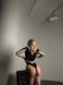 Однотонний боді з сіткою жіночий чорного кольору R1545/487 фото 6 — Beauty&Fashion