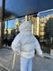 Теплая меховая куртка с наполнителем экопух женская молочного цвета S 50 фото 6 — Beauty&Fashion