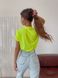 Летняя однотонная свободного кроя женская футболка желтого цвета 8891 фото 5 — Beauty&Fashion