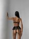 Приятный однотонный прозрачный комплект нижнего белья (бюстгальтер+трусики стринги+пояс-юбочка для чулок) женский черного цвета SM2186 фото 7 — Beauty&Fashion