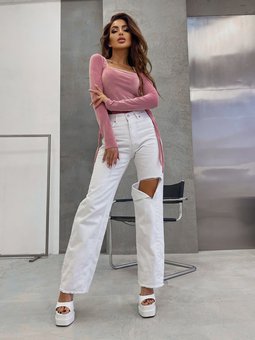 Однотонні вільного крою джинси з диркою жіночі білого кольору фото — Beauty&Fashion