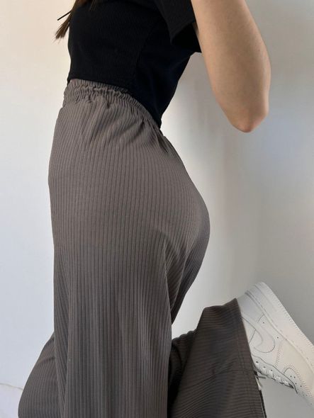 Літні однотонні вільного крою штани в рубчик жіночі чорного кольору фото — Beauty&Fashion