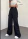 Вільного крою однотонні спортивні штани карго жіночі чорного кольору RA6220/1293 фото 4 — Beauty&Fashion