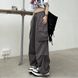 Однотонные стильные брюки карго свободного кроя женские шоколадного цвета R1347 /639 фото 4 — Beauty&Fashion