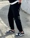 Однотонные стильные джинсы мом с потертостями мужские черного цвета N03302 фото 4 — Beauty&Fashion