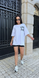Літня вільного крою футболка з принтом жіноча білого кольору фото — Beauty&Fashion
